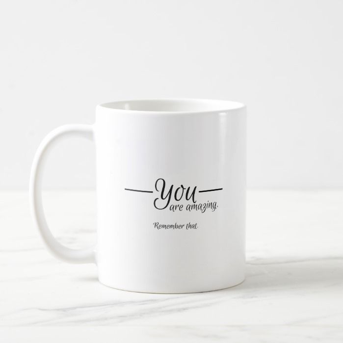 a white coffee mug with the words you are amazing written in cursive font