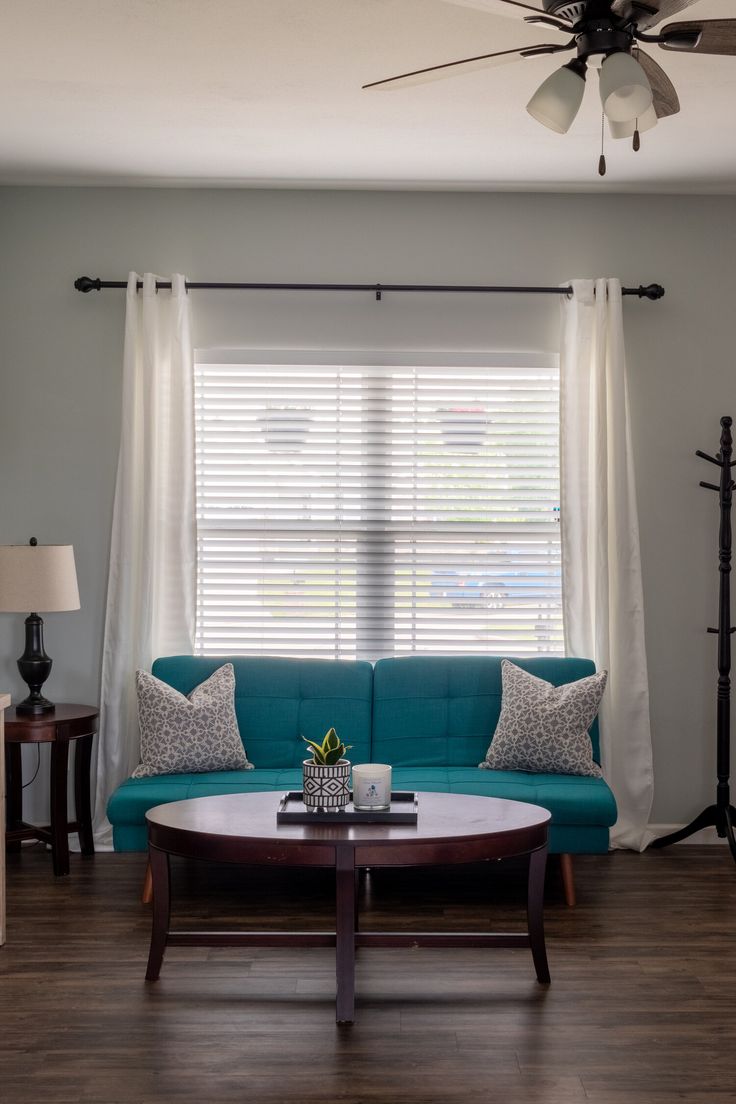 the living room is clean and ready to be used as a den or family room