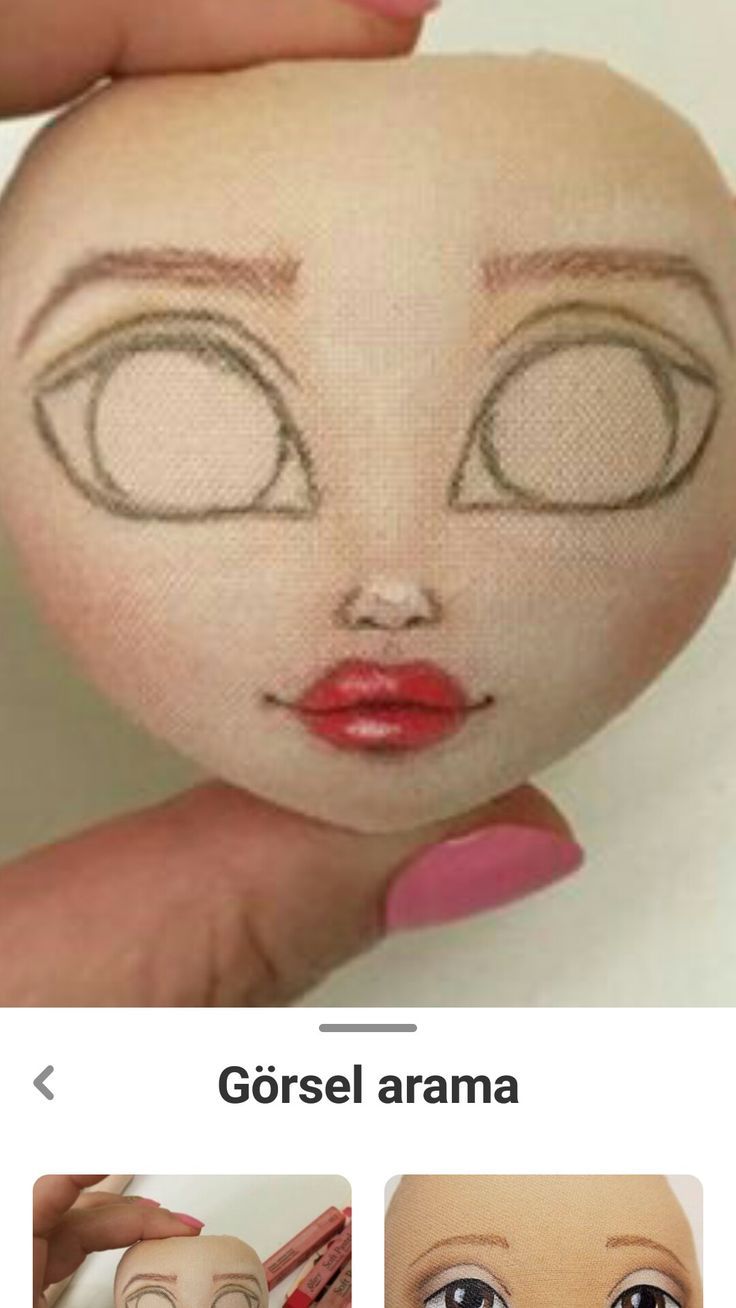 an image of a doll with eyes drawn on it's face and the words gorsel arama