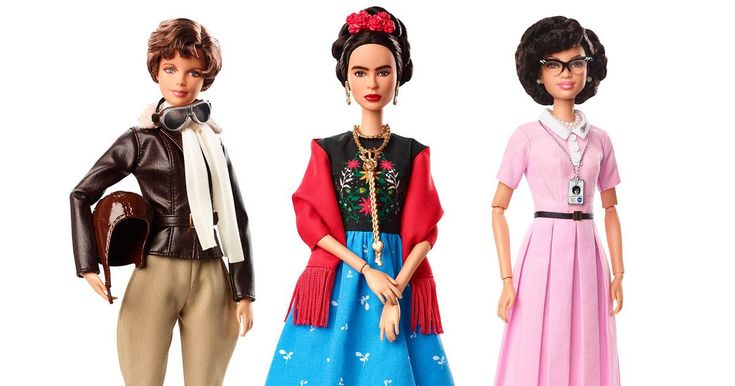 three barbie dolls are dressed in different outfits