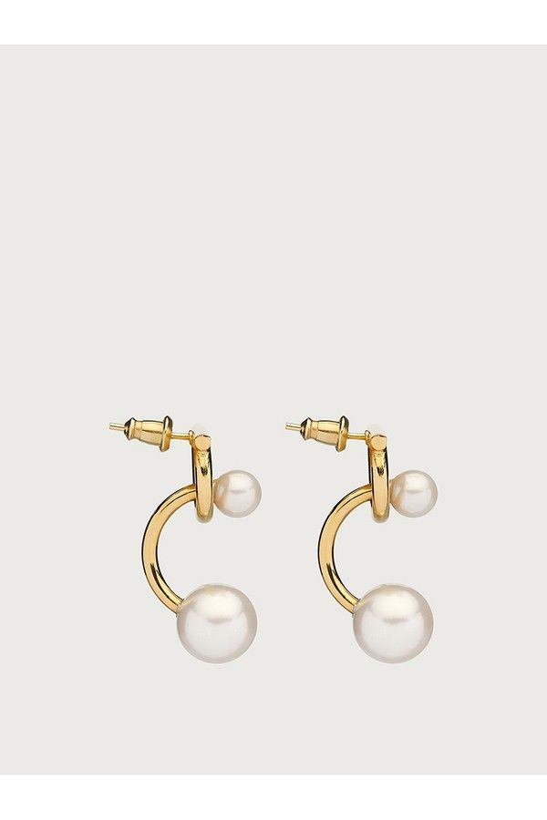 Find SALVATORE FERRAGAMO Gancini Earrings With Synthetic Pearls on Editorialist. Modern interpretation of the Gancini earring, with a flat silhouette and a tilting element decorated with a beautiful pearl bauble. The shape is inspired by body piercing, for a rock chic touch with your daily looks. brass and plexiglas Pearl Piercing, Rock Chick Style, Pave Ear Cuff, Faux Pearl Earrings, Piercing Ideas, Rock Chic, Gold Pearl Earrings, Oval Earring, Enamel Earrings