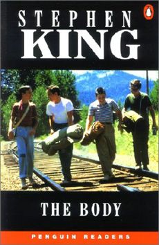 the book cover for the body by stephen king, with three men standing on railroad tracks