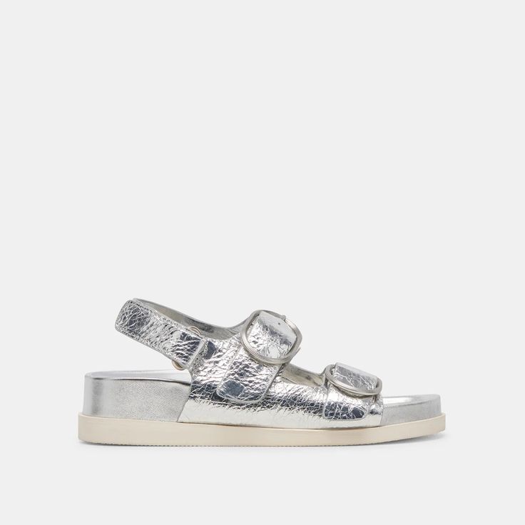 Step into summer with Dolce Vita's Starla Sandals in Silver Distressed Leather. Trendy, chic, and comfortably stylish. Shop now! Combat Boots Heels, Dolce Vita Sandals, Felt Cowboy Hats, Utilitarian Style, Boot Jewelry, Buckle Bracelet, Trendy Chic, Leather Silver, Distressed Leather