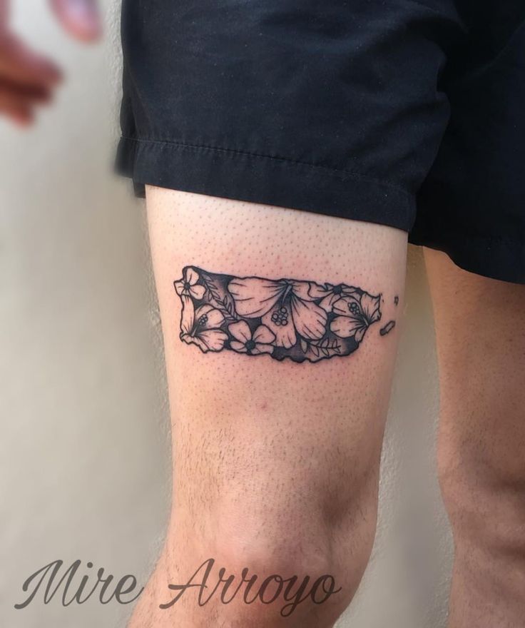 a person with a tattoo on their leg