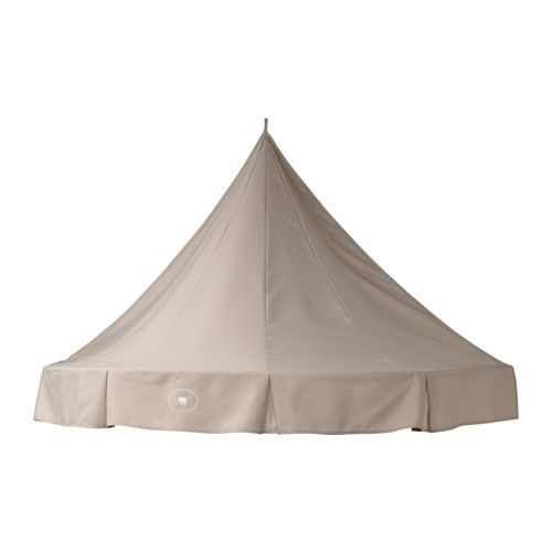 a large white tent sitting on top of a table