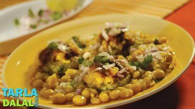 a yellow bowl filled with food on top of a table