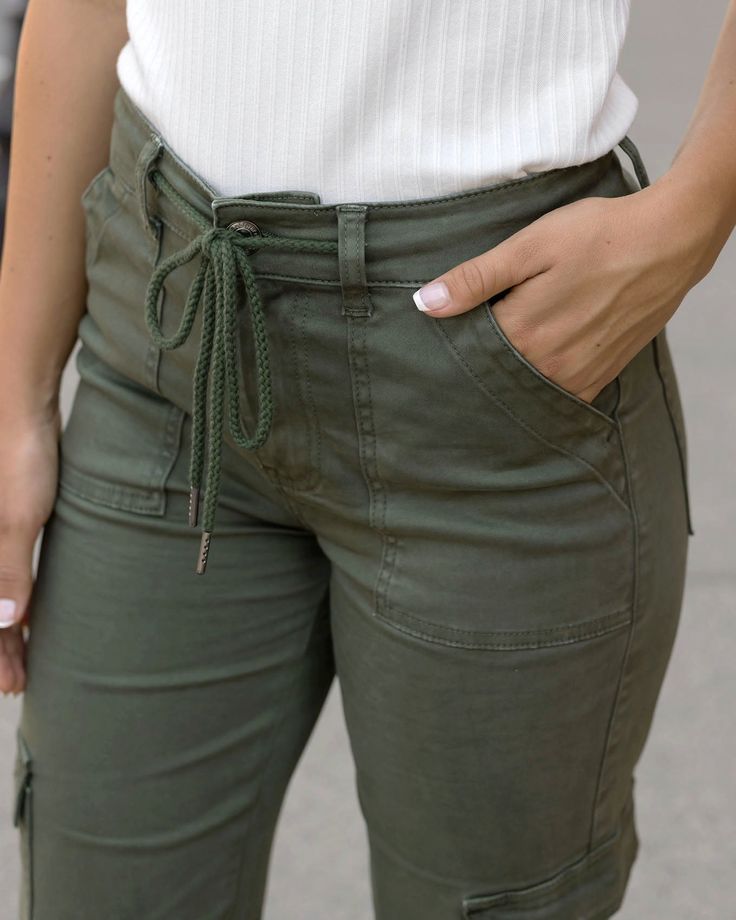 Sueded Twill Cargo Pants | Green Twill Cargo Pants The cargo pants set apart from all the rest! The new Sueded Twill Cargo Pants give you our signature, comfortable sueded twill fabric, in the wide leg cargo pant style that’s at the top of the trends! Why you’ll love them: Wide leg twill cargo pants in deep green Soft brushed (sueded) twill material with slight stretch Functional square front pockets and cargo pockets , with comfortable mid rise and encased rope drawstring Designed to coordinate Cargo Pant Style, Cargo Pants Green, Cargo Pants Style, Grace And Lace, Green Cargo Pants, Set Apart, Pants Green, Green Soft, Green Cargo