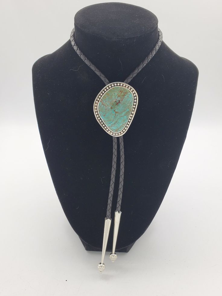 Kingman gem grade Red Vein Turquoise Bolo Tie. This turquoise is from The Julian Collection. high grade stone, set in sterling. Simple and timeless, this will certainly make a statement. Absolutely stunner stone in this bolo. Well worth the price! All of the turquoise chosen for my bolo ties is absolutely some of the best old stock that can be found. Always priced fairly to ensure value, these are heirloom caliber. Unique Turquoise Jewelry With Stone Setting, Classic Adjustable Jewelry With Natural Stones, Handmade Luxury Turquoise Jewelry, Classic Jewelry With Natural Stones, Luxury Handmade Turquoise Jewelry, Southwestern Adjustable Jewelry With Stones, Adjustable Turquoise Jewelry With Stone Setting, Turquoise Necklace With Gemstone Accents, Artisan Turquoise Jewelry For Formal Occasions