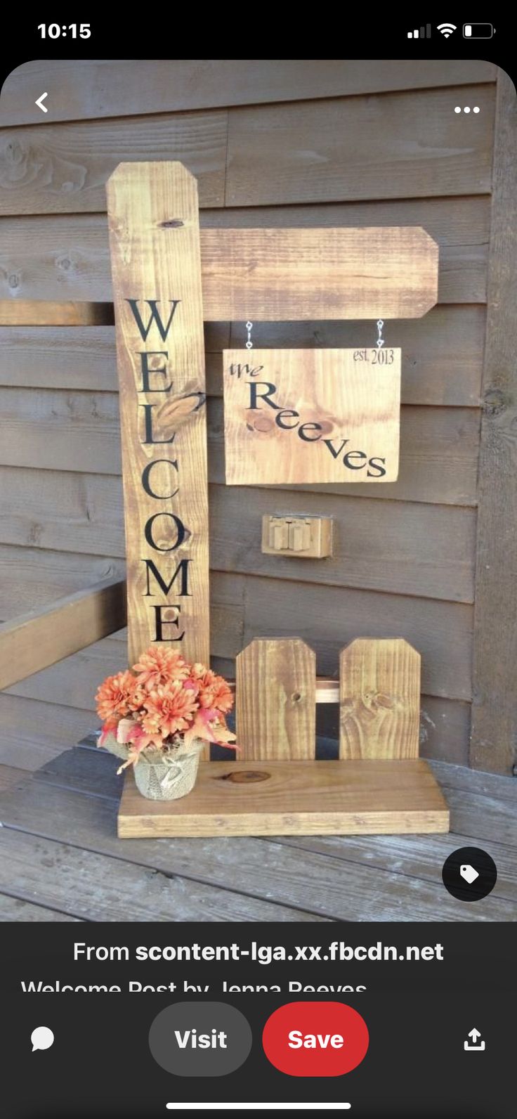 a wooden sign that says welcome on it