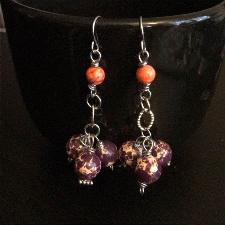 These Handcrafted One Of A Kind Earrings Are Made With Purple Impression Jasper Rounds And Orange Howlite Rounds On Fish Hook Ear Wires. Ear Wires Are Nickel Free. Earrings Measure 2”. Designed And Handcrafted By Me Boho Bohemian Gypsy Witchy Hippie Hippy Festival Summer Gemstone Spring Vacation Jewelry Earrings Artisan Unique Purple Earrings With Ear Wire, Unique Purple Earrings With Dangling Beads, Adjustable Wire Wrapped Purple Beaded Earrings, Adjustable Purple Wire Wrapped Beaded Earrings, Handmade Purple Dangle Earrings, Adjustable Purple Earrings, Purple Sterling Silver Beaded Dangle Earrings, Purple Wire Wrapped Beaded Earrings For Gift, Purple Dangle Beaded Earrings Wire Wrapped