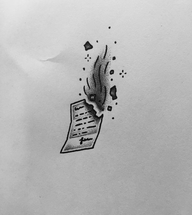 a piece of paper that has been inked on the back of it, with a fire coming out of it