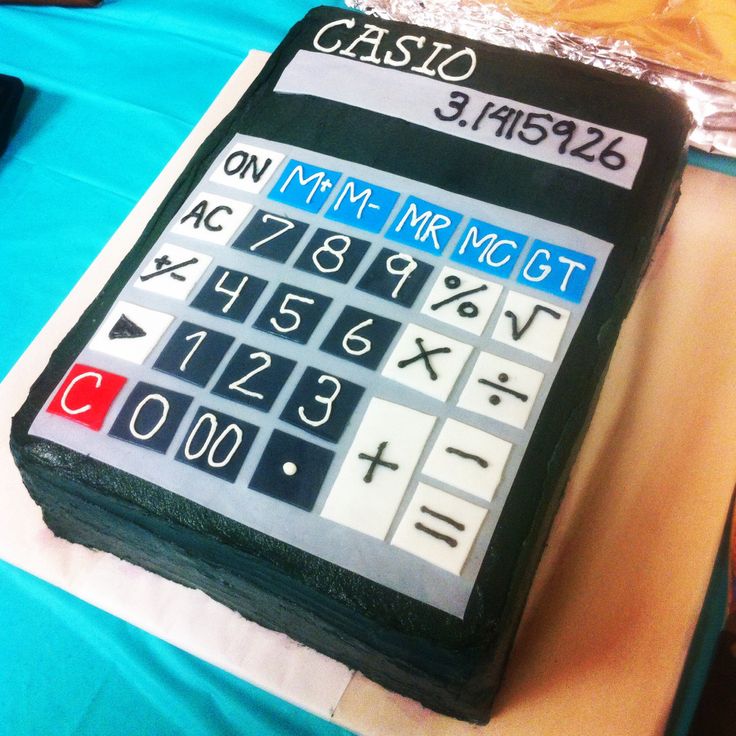 a calculator cake is sitting on a table