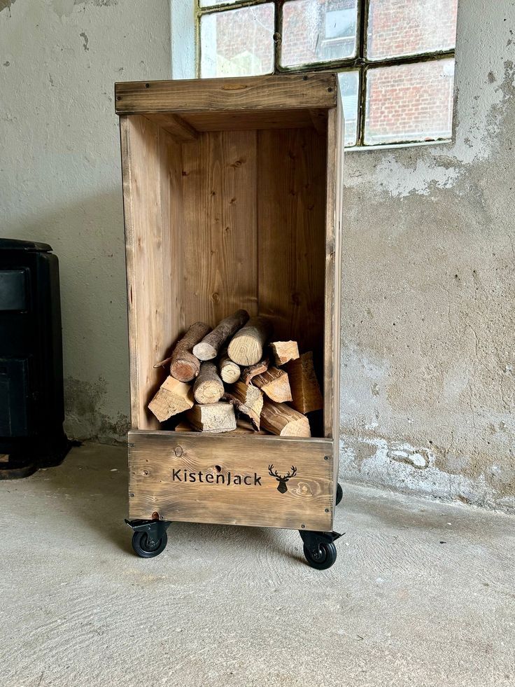 a wooden crate with firewood stacked in it