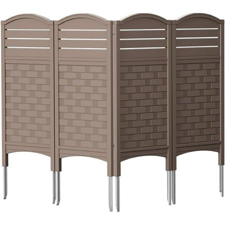 three brown privacy screens with metal legs on each side and one in the middle, both facing opposite directions