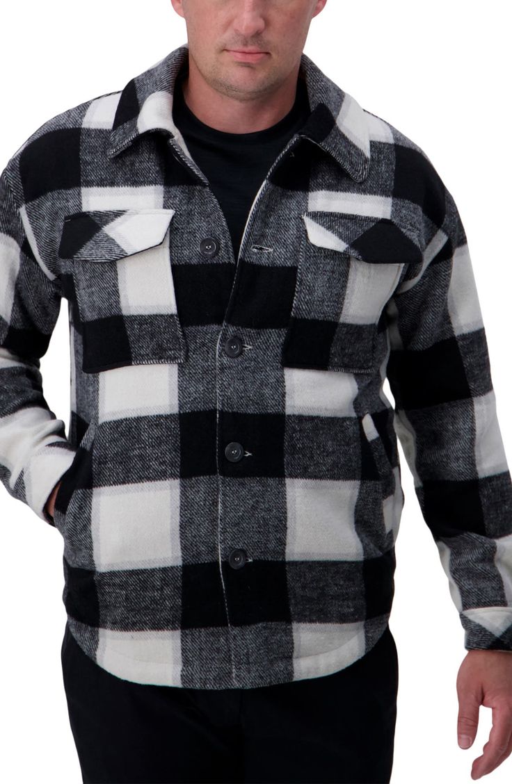 The perfect year-round layering jacket for all occassions. Featuring a spread collar, button cuffs, chest snap pockets in a warm quilted interior and an on-trend plaid exterior design. Regular fit Spread collar Long sleeves with single button cuffs Front button closures Chest snap flap pockets Side welt pockets Buffalo plaid check print Quilted interior 46% polyester, 26% acrylic, 13% rayon, 8% nylon, 4% wool, 3% other fibers Machine wash cold Imported Model's stats for sizing: 6'1" height, 32" Collared Outerwear With Button Closure For Outdoor, Black Quilted Jacket With Button Closure For Fall, Button-up Plaid Outerwear For Outdoor, Plaid Button-up Outerwear For Outdoor, Plaid Button-up Outdoor Outerwear, Plaid Outerwear With Button Closure And Spread Collar, Plaid Shacket With Snap Buttons For Winter, Black Single-breasted Shacket For Winter, Winter Plaid Shacket With Snap Buttons