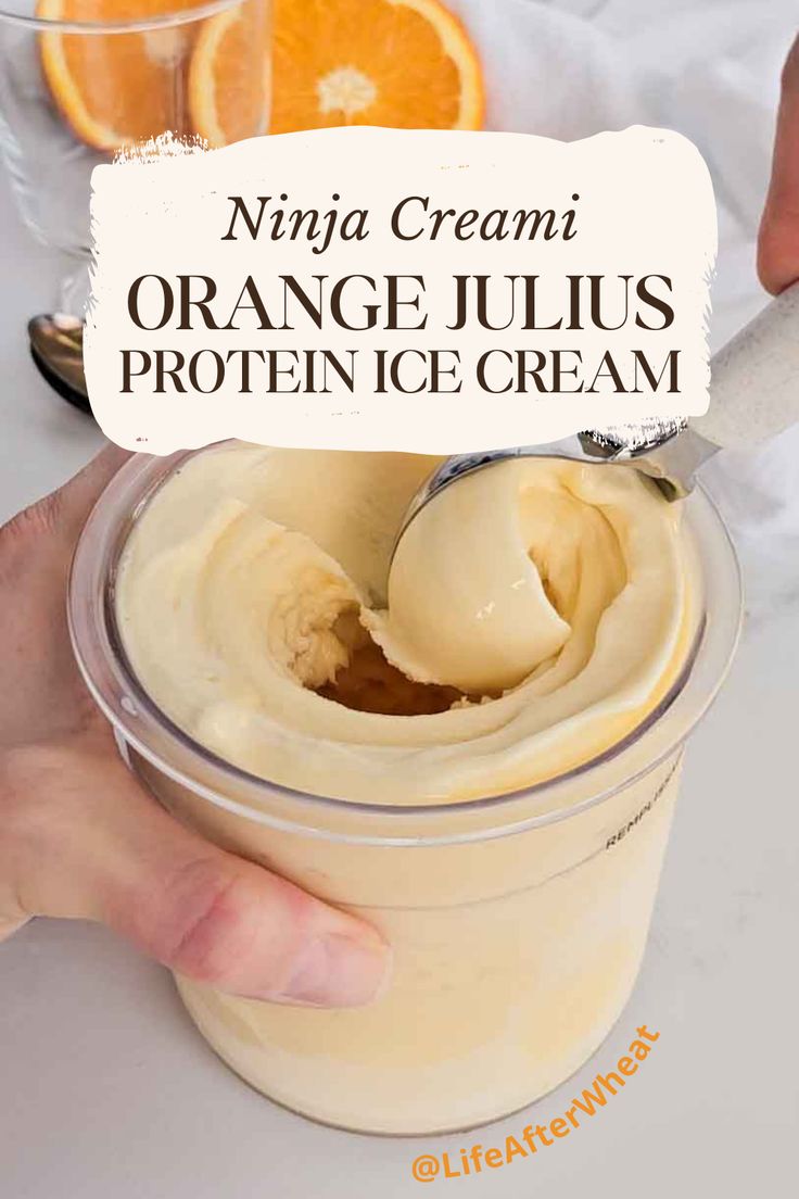 an orange juice is being poured into a jar with the words, ninja creami orange jujulus protein ice cream