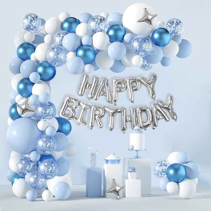 a happy birthday balloon arch with blue and white balloons