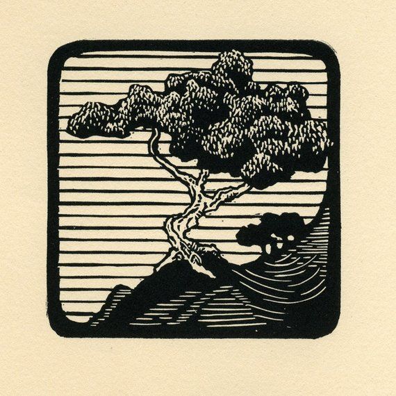 a black and white drawing of a tree on top of a hill