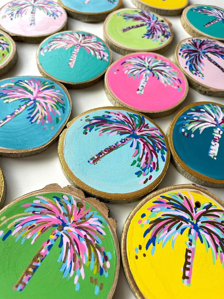 colorful painted cookies with palm trees on them