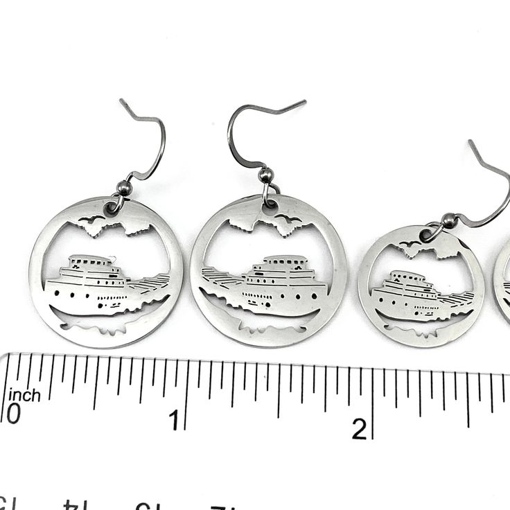 Great Lakes Freighter Earrings, Stainless steel non-tarnish. Our earrings are cut from thick shiny Stainless Steel Fish Hook style Stainless Steel Earwires Petite size charm measures just over 3/4" wide (18mm) Large Charm is 23 mm or just shy of 1" Stainless steel / non-tarnish / no plating See Care and Wear Instructions on home page for more information on Stainless Steel jewelry Matching Pendants in two sizes also available ⓒ Copyright All Designs and Images by Be Inspired UP. All Rights Reserved. Pierced Stainless Steel Hoop Earrings, Nickel-free Stainless Steel Drop Earrings, Nickel Free Stainless Steel Drop Earrings, Hypoallergenic Stainless Steel Round Earrings, Hypoallergenic Round Stainless Steel Earrings, Nickel-free Stainless Steel Round Earrings, Nickel-free Round Surgical Steel Jewelry, Nickel-free Round Stainless Steel Earrings, Hypoallergenic Round Surgical Steel Earrings