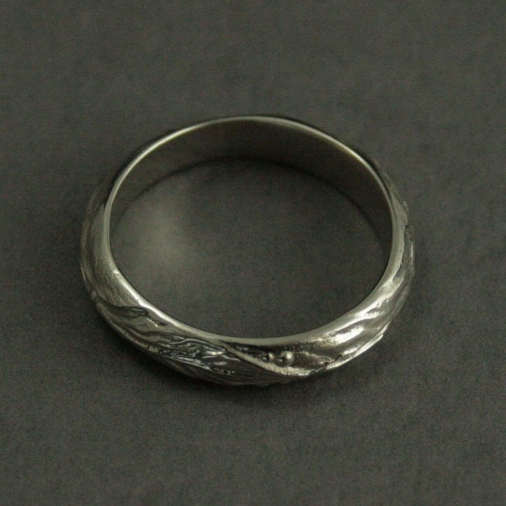 Elven Ring Leaf Band Fantasy Ring Elven Jewelry Elf Ring Elvish Ring Gold Elven Ring Men's Wedding Ring Women's Band Nature Lover Ring Now our Popular Elven Band is available in solid 14K Gold! Hand cast in our studio, this is a wonderful band for the nature lover in your life. It features an intricate leaf design in relief around the entire band. Measuring a hefty 5mm wide by 2mm thick, this is a solid band to last a lifetime! Organic and unique, you can't go wrong with this band! Blazer Arts i Polished Open Promise Ring Bands, Round Wedding Rings With Polished Finish, Sterling Silver Dome Wedding Ring, Round Sterling Silver Dome Wedding Ring, Sterling Silver Dome Ring For Wedding With Polished Finish, Silver Diamond Ring With Decorative Band, Wedding White Gold Dome Ring With Polished Finish, Silver Wedding Rings With Decorative Band, Silver Decorative Diamond Promise Ring