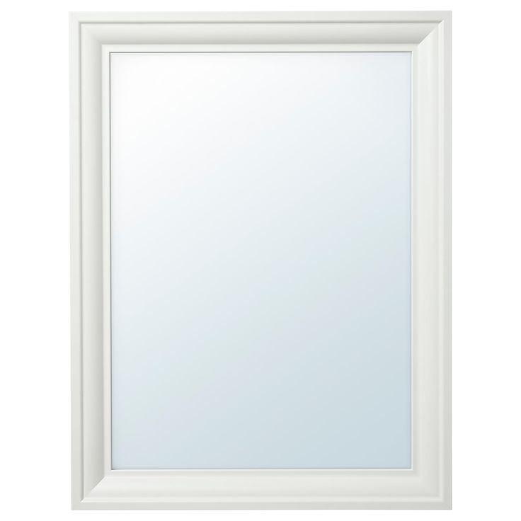 an empty white framed mirror on a white wall with clipping area for text or image