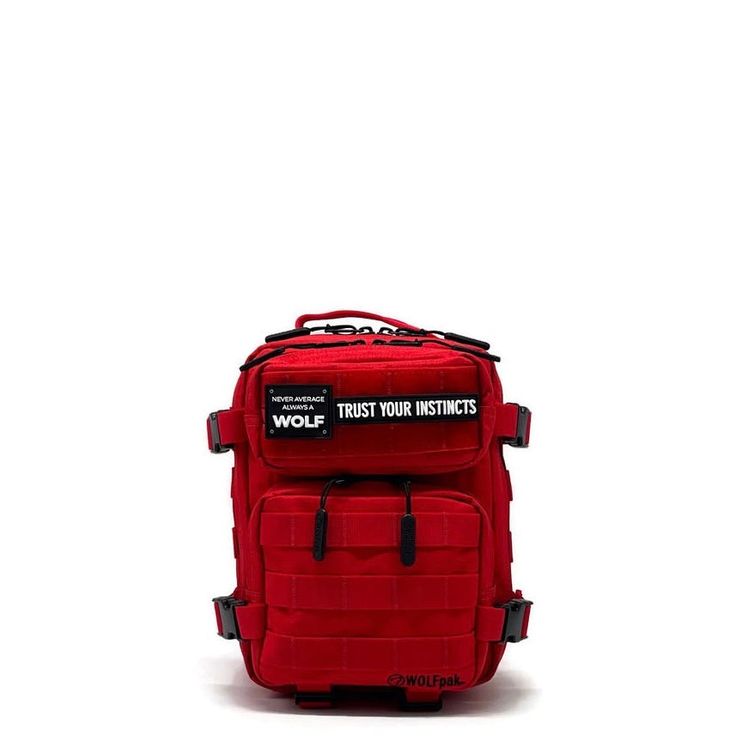 a red backpack with the words wolf trust your instructs on it's side