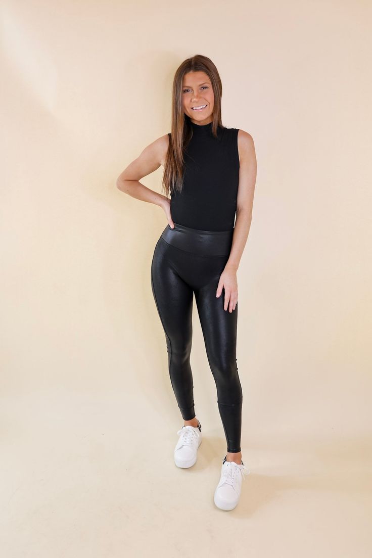 Add some sass to your closet with these CUTE leggings! This best-selling style features sleek, smoothing faux leather fabric that shapes and lifts and our contoured Power Waistband for core compression. Many fans say these leggings fit somewhat small. We recommend sizing up if in between sizes. Inseam measures 30 inches. Sleek and smoothing faux leather fabric shapes and lifts Contoured Power Waistband for core compression High waisted design No front seam to eliminate unnecessary creases Model: Versatile High Stretch Leggings For Night Out, Sleek Faux Leather Leggings, Sleek High Stretch Leather Pants, Sleek High Stretch Black Leather Pants, Sleek High Stretch Faux Leather Leggings, Sleek Stretch Faux Leather Leggings, High Stretch Black Faux Leather Leggings, Sleek Solid Color Faux Leather Leggings, High Stretch Black Leather Pants