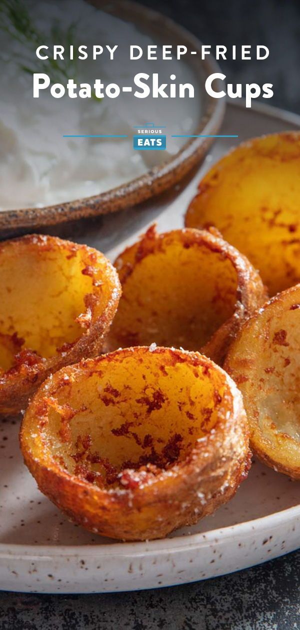 crispy deep fried potato - skin cups on a plate