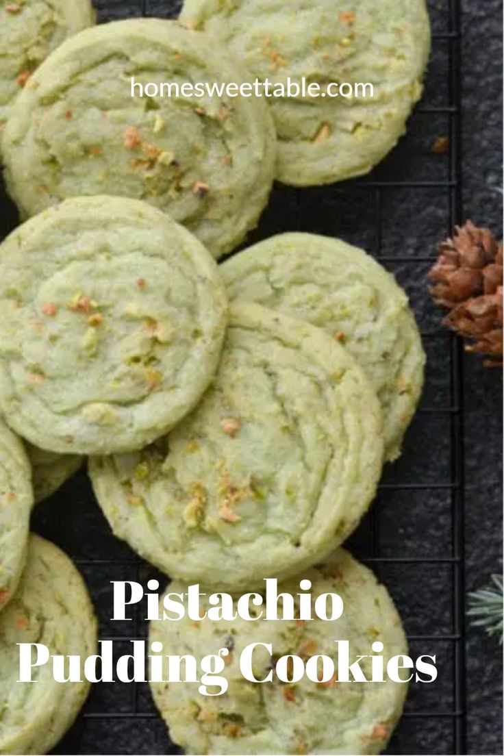 pistachio pudding cookies on a cooling rack with pine cones