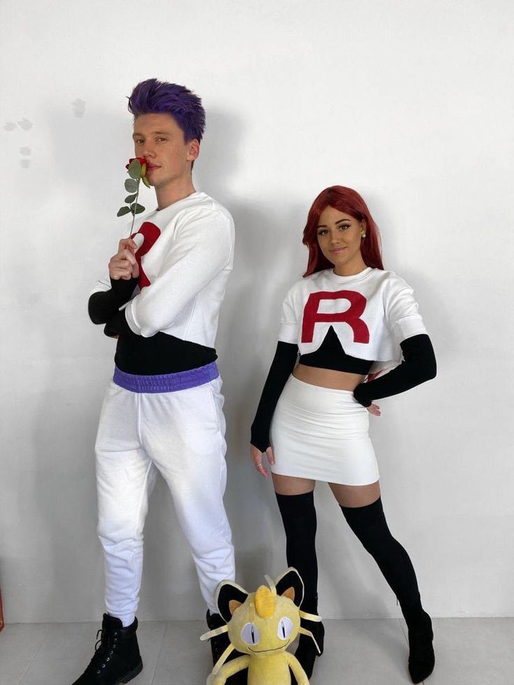 two people dressed up as pokemon and pikachu, one is holding a rose