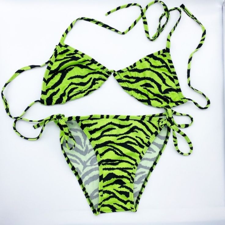 Classic String Bikini Green & Black Zebra Print Adjustable And Ties One Size/ Os Brand New-- Never Worn Or Tried On Did Not Come With Tags But In Original Packaging. Be Economical And Look Great Everyday Of Your Vacation! Have A New Look Every Time You Go Back Out To The Pool! Check Out My Other Options For Bikinis. Black Fitted Swimwear With Zebra Print, Fitted Black Zebra Print Swimwear, Fitted Zebra Print Swimwear For Summer, Black Zebra Print Swimwear For Beach Season, Fitted Zebra Print Triangle Top Swimwear, Black Tiger Print Swimwear For Beach, Fitted Tiger Print Swimwear For Vacation, Fitted Tiger Print Swimwear For Summer, Zebra Animal