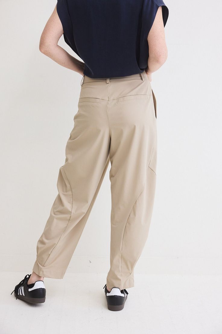 The devil is in the details. These tapered pants have a relaxed fit. Made with our iconic Core nylon fabric, these pants feel like loungewear. Click here for Standard Fit Everyday Parachute Pants With Side Pockets For Spring, Baggy Ankle-length Parachute Pants With Hip Pockets, Versatile Ankle-length Harem Pants With Pockets, Utility Pants With Hip Pockets For Loungewear, High-waisted Cargo Pants For Everyday, Everyday Trousers With Patch Pockets, Everyday Tapered Leg Pants With Patch Pockets, Everyday High-waisted Pants With Cargo Pockets, Loosely Fitted Harem Pants With Cargo Pockets