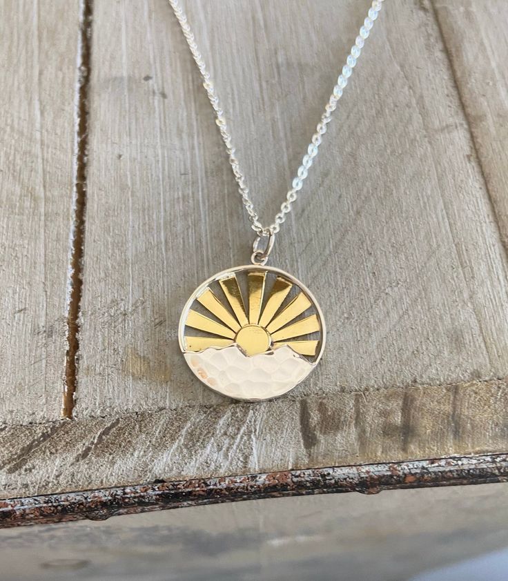 "Mountain Sunrise * 0.8\" x \".6 * 21mm x 15mm Palm Tree Pendant * 0.8\" x \".6 * 21mm x 15mm Sunburst Pendant * 1\" x .75\" * 26mm x 20mm Chain: * 1.3mm fine link Available: * Sterling Silver ∆ All pieces of the sterling silver necklaces are solid high quality sterling silver. Item #S3114 S3115 A1789" Nickel Free Sterling Silver Pendant Charm Necklace, Sterling Silver Hallmarked Pendant Necklace, Silver Engraved Charm Necklace For Everyday, Everyday Sterling Silver Round Charm Necklaces, Everyday Sterling Silver Engraved Charm Necklace, Everyday Silver Engraved Charm Necklace, Everyday Round Sterling Silver Charm Necklace, Everyday Spiritual Sterling Silver Jewelry, Spiritual Sterling Silver Charm Necklaces In Silver