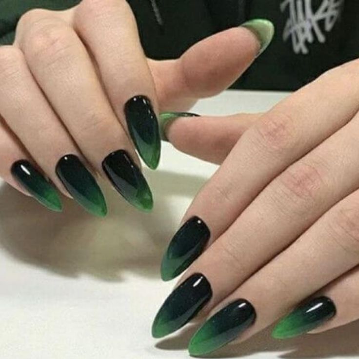 There is a time and place for classic nail shades, but if you’re looking for a contemporary twist, look no further than… Ombre Goth Nails, Black And Green Ombré Nails, Green Goth Nails Grunge, Dark Green Gradient Nails, Dark Green Ombre Acrylic Nails, Goth Chic Nails, Ferxxocalipsis Nails, Goth Coffin Acrylic Nails, Witchy Ombre Nails