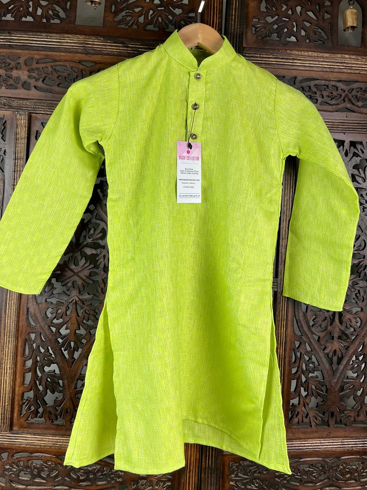 Premium Quality Boys Kurta Pajama Set !! Kurta Pajama Set for Boys in Cotton. Cotton is very soft material and is skin-friendly. Its a Set that includes Kurta and Churidar Pajama. Item : Boys Kurta PajamaReady to Wear : YesKurta Color : Parrot Green Pajama Color : White Fabric : Pure CottonPocket : YesLining : NoDisclaimer- There can be little variation in the color due to screen resolution setting, phone display setting or anything else. Kindly do not hold us responsible.- No return or exchange Green Jamawar Kurta With Dupatta, Fitted Pista Green Cotton Kurta, Green Kurta Pajama Men, Green Colour Kurta For Men, Parrot Green Kurta For Men, Boys Kurta, Churidar, Green Cotton, White Fabrics