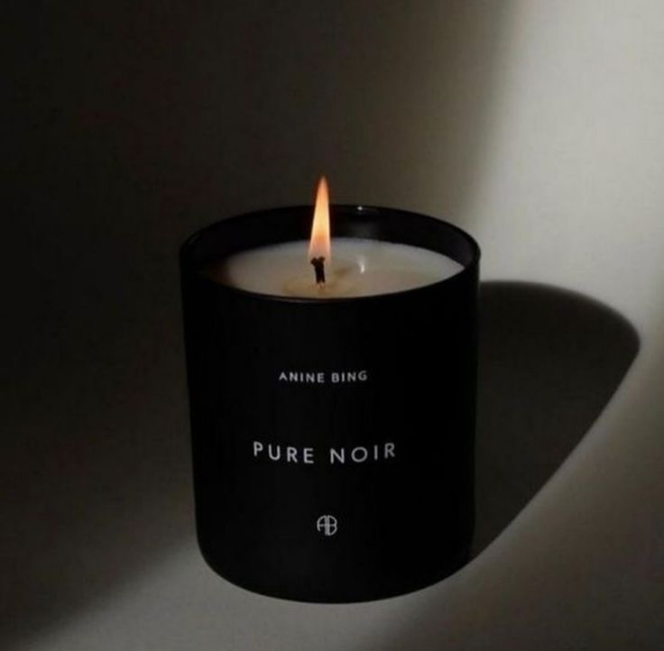 a candle that is sitting in the dark