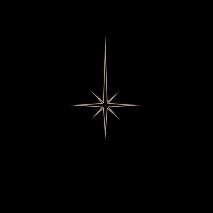 a gold star on a black background