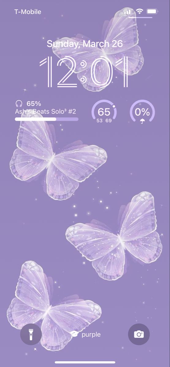 the purple butterflies are flying through the air