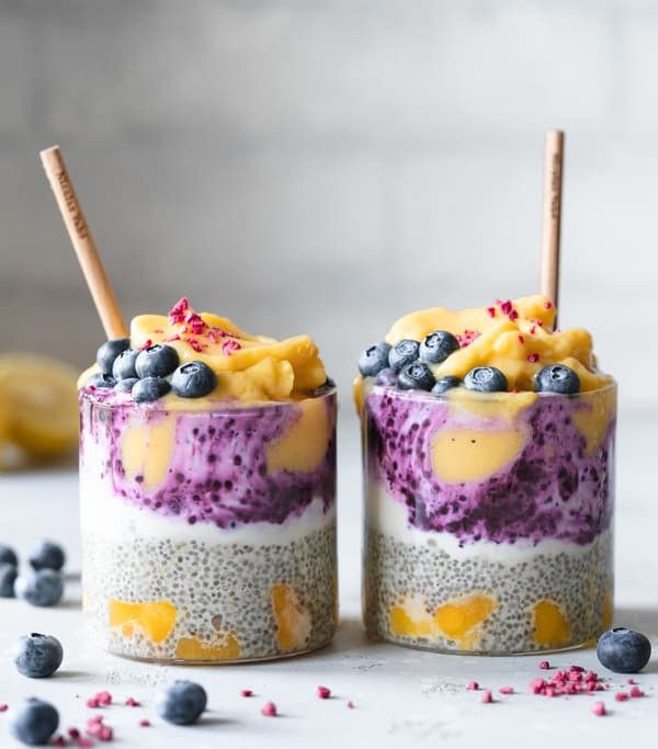 two glasses filled with blueberry chia pudding