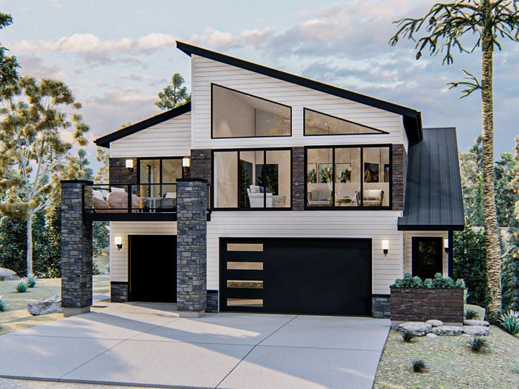 this is an artist's rendering of a modern house with two car garages