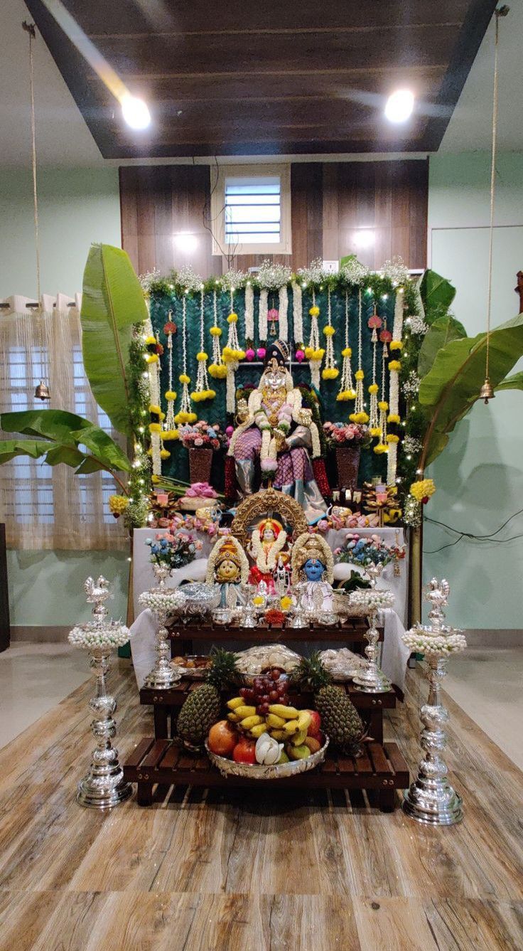 the altar is decorated with fruits and candles