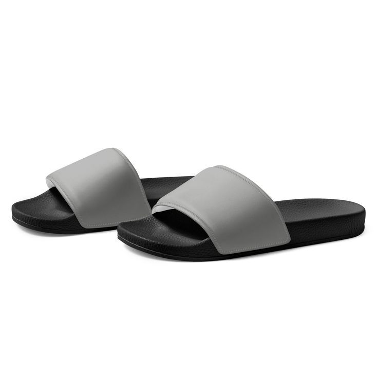 Looking for a stylish and practical pair of slides for your next beach or pool day? Check out our Bombay Color Women's Slides! These slides are perfect for those who want a no-fuss, casual look that still looks great. With their simple design and comfortable fit, these slides are sure to become your go-to choice for any summer outing. So why wait? Add these Bombay Color Women's Slides to your c today and get ready to hit the beach in style! Women's Slides Product Details: • Comfortable Strap: Fe Casual Gray Slip-on Sport Sandals, Casual Gray Slip-on Flip Flops, Casual Gray Sport Sandals With Cushioned Footbed, Comfortable Gray Slip-on Flip Flops, Comfortable Gray Sandals For Summer, Casual Flat Sport Sandals For Beach, Casual Beach Slides, Casual Beach Slippers With Synthetic Material, Gray Non-slip Comfortable Slides