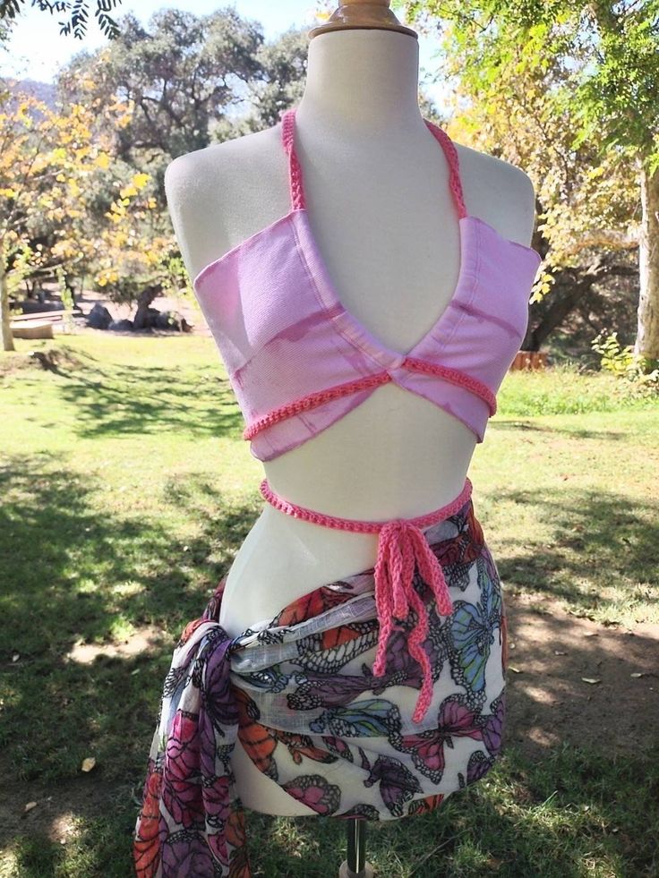 Large Pink tie dye tube top with wrap around straps. Summer Triangle Halter Top With Wrap-around Straps, Summer Beach Halter Top With Wrap-around Straps, Summer Strappy Halter Top With Wrap-around Straps, Sleeveless Festival Tube Top For Summer, Summer Wrap Top With Tie Back, Summer Beach Wrap Crop Top, Spring Beach Wrap Crop Top, Summer Triangle Top Tube Top, Purple Summer Tube Top For Beach