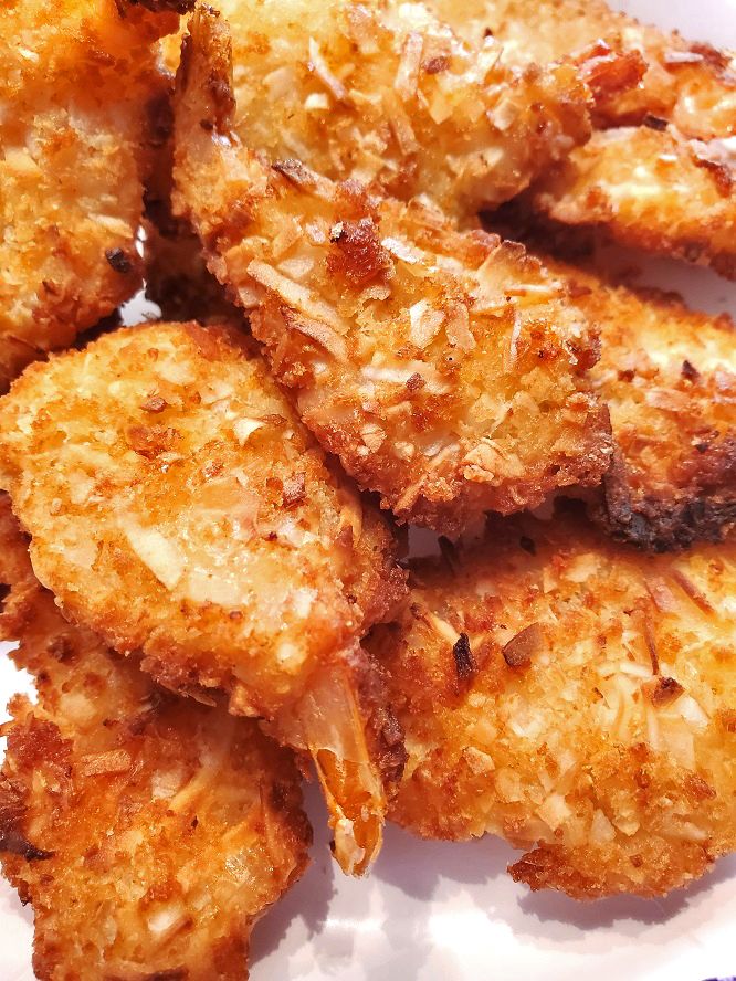 some fried food is on a white plate