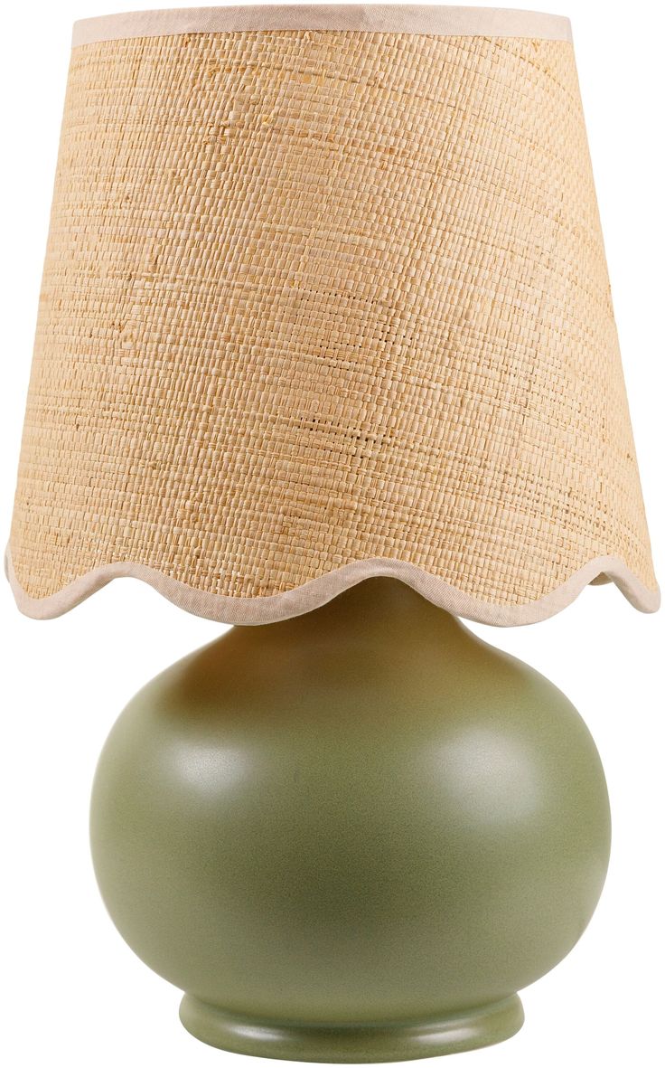 a green table lamp with a beige shade on the top and bottom part of it