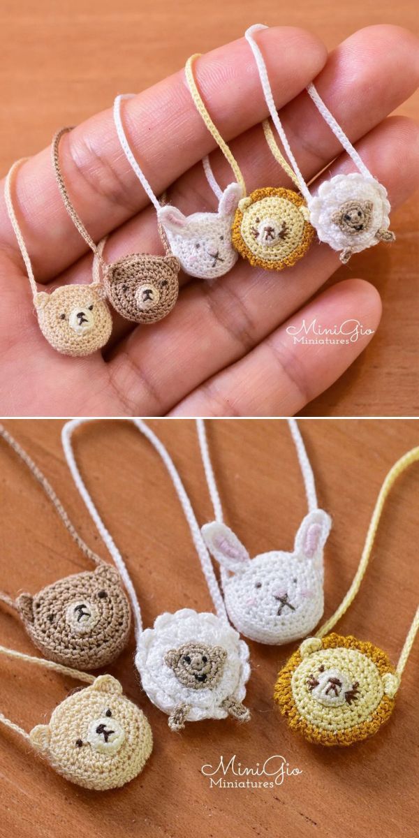 small crocheted animal pendants in different colors and sizes are being held by someone's hand