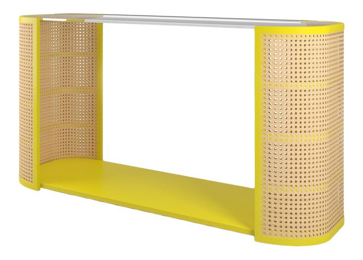 a yellow shelf with perfored design on it