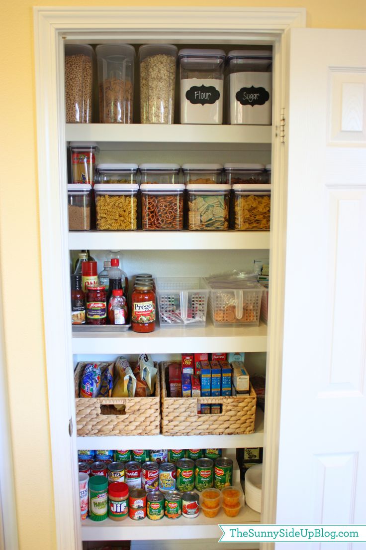 an organized pantry with lots of food in it