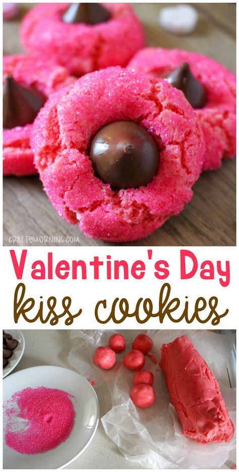 valentine's day kiss cookies with pink frosting and chocolate in the middle, on top